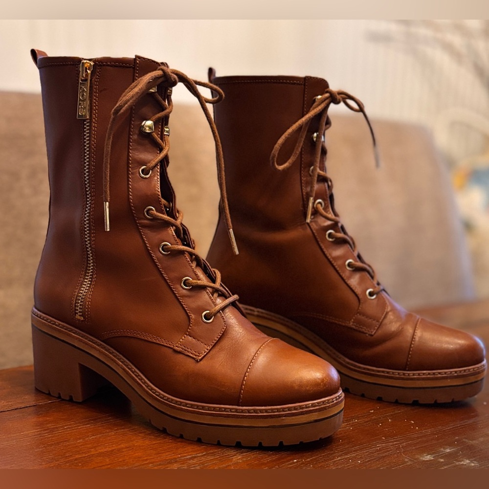 Michael Kors Brown Ankle Boots with Lace-Up Design and gold zipper with logo.